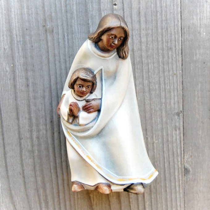 Pastierka s dieťaťom - Africký