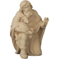 Shepherd kneeling with sheep - Folk