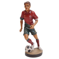 Drevená socha futbalistu