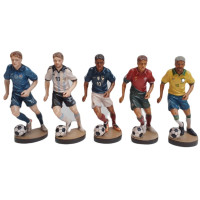 Drevená socha futbalistu