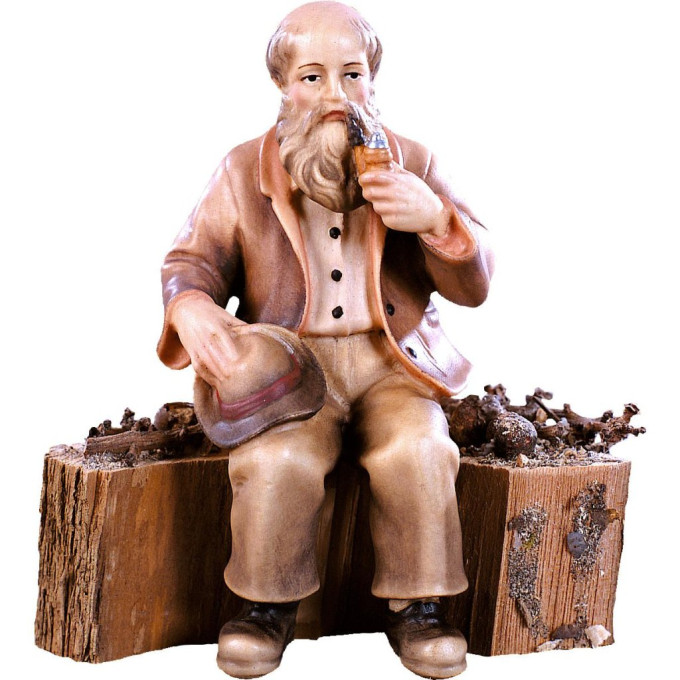 Dedko sediaci na kmeni