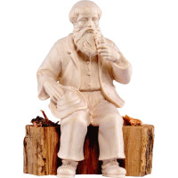 Dedko sediaci na kmeni