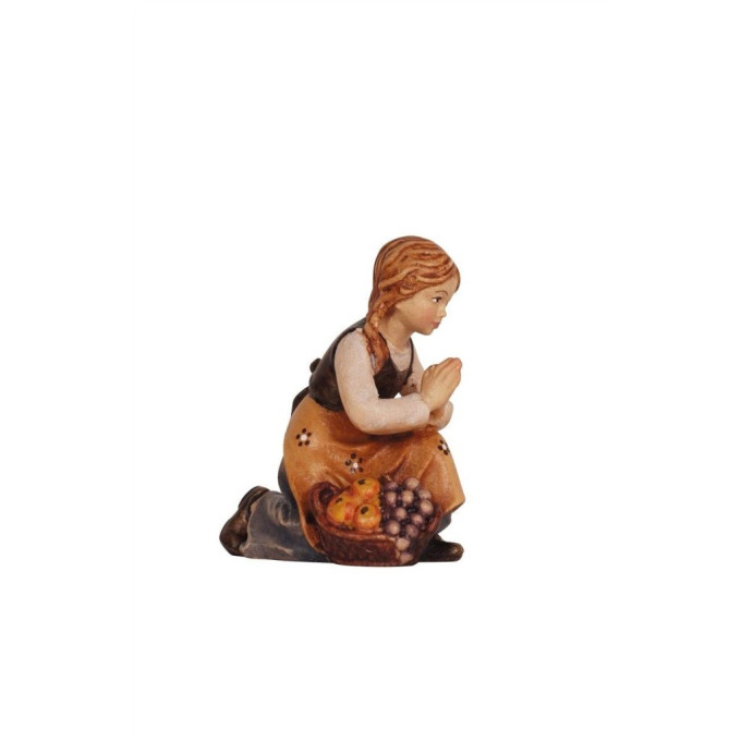 Girl kneeling for Nativity scene - Homeland