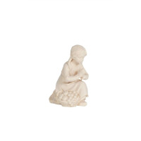 Girl kneeling for Nativity scene - Homeland